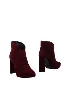 Полусапоги и высокие ботинки Stuart Weitzman