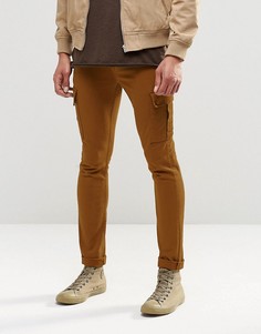 Супероблегающие джинсы цвета ржавчины с карманами‑карго ASOS - Коричневый