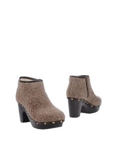 Полусапоги и высокие ботинки À Trois