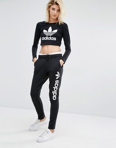 Спортивные штаны с оversize-логотипом adidas Originals - Черный