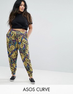 Гаремные брюки с тропическим принтом и отворотом на поясе ASOS CURVE - Мульти