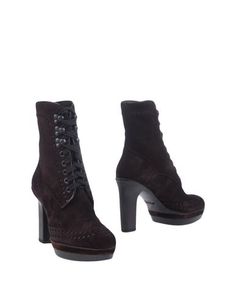 Полусапоги и высокие ботинки Santoni