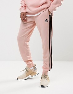 Розовые джоггеры с манжетами adidas Originals Superstar BS4656 - Розовый