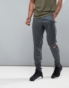 Серые суженные книзу брюки Reebok Training B45122 - Серый