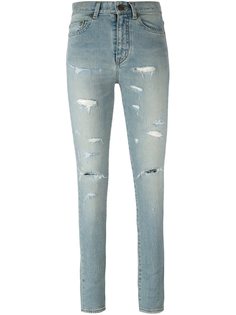 рваные узкие джинсы Saint Laurent
