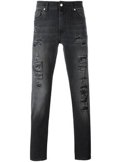 узкие джинсы с протертостями Alexander McQueen
