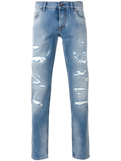 джинсы с рваными деталями Dolce & Gabbana