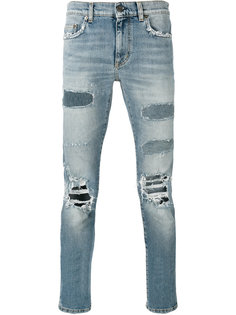 прямые джинсы с прорезными деталями Saint Laurent