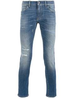джинсы скинни с рваными деталями Dolce & Gabbana