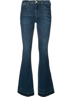выбеленные расклешенные джинсы Frame Denim