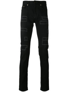 джинсы скинни с заплатками Saint Laurent