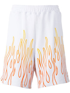 шорты с принтом языков огня Omc
