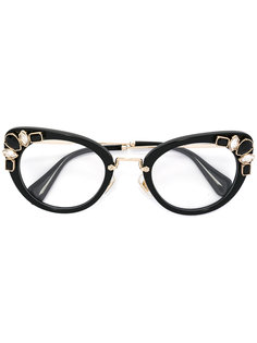 очки в оправе "кошачий глаз" Miu Miu Eyewear