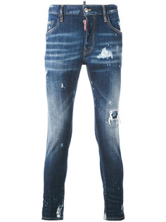 зауженные джинсы с эффектом потертости Dsquared2