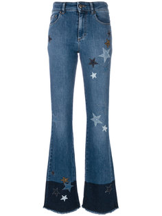 расклешенные джинсы с нашивками звезд Red Valentino