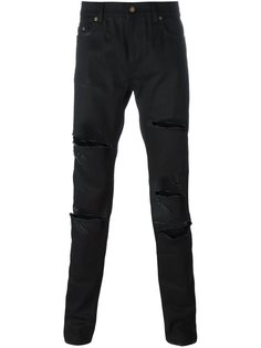 джинсы кроя слим с рваными деталями Saint Laurent