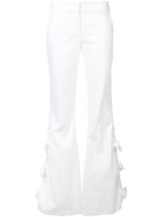 bow applique flared trousers Alexis