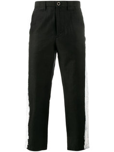 брюки с контрастными полосками по бокам Maison Mihara Yasuhiro