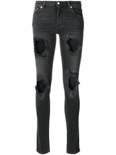 джинсы с потертой отделкой Givenchy