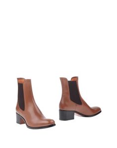 Полусапоги и высокие ботинки Santoni