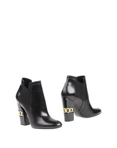 Полусапоги и высокие ботинки Casadei