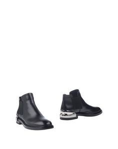 Полусапоги и высокие ботинки Casadei