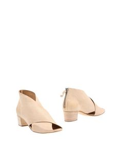 Полусапоги и высокие ботинки Halmanera