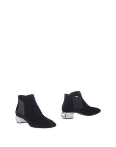 Полусапоги и высокие ботинки Casadei