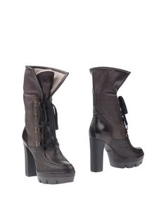 Полусапоги и высокие ботинки Santoni