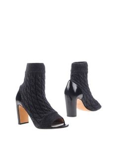 Полусапоги и высокие ботинки Maison Margiela
