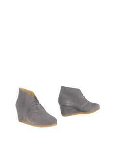 Полусапоги и высокие ботинки Clarks