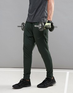 Зеленые флисовые штаны из быстросохнущей ткани Dri-FIT Nike Training 742212-332 - Зеленый