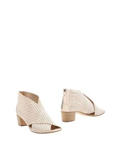 Полусапоги и высокие ботинки Halmanera