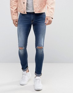 Супероблегающие джинсы с дырками на коленях ASOS - Синий