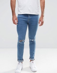 Синие супероблегающие джинсы с рваной отделкой New Look - Синий