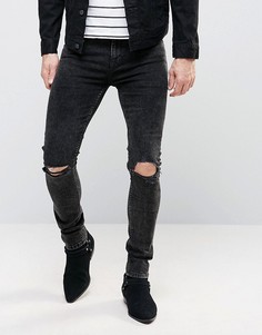 Ультразауженные джинсы скинни с рваными коленями ASOS - Черный