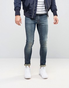 Темно-синие суперзауженные джинсы ASOS - Синий