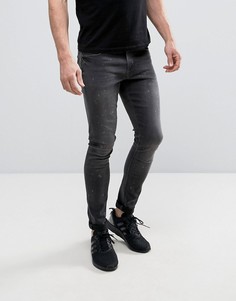 Выбеленные черные супероблегающие джинсы с эффектом брызг краски ASOS - Черный