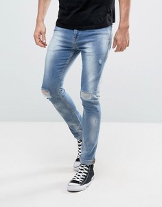 Супероблегающие выбеленные джинсы с прорехами ASOS - Синий