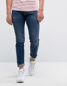 Узкие джинсы с нашивкой в виде знака мира Love Moschino - Синий