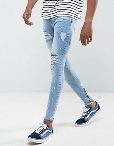 Супероблегающие джинсы с рваной отделкой Rose London - Синий