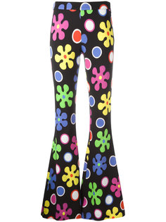 расклешенные брюки с цветочным украшением Moschino