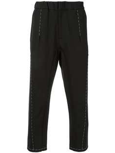 exposed stitch cropped trousers Oamc