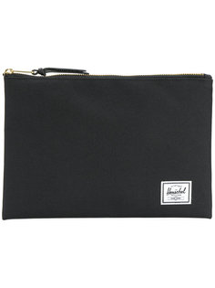 branded clutch Herschel Supply Co.