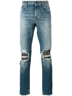 джинсы с заклепками Saint Laurent