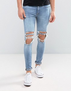 Умеренно выбеленные супероблегающие джинсы с прорехами New Look - Синий