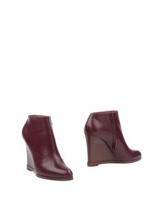 Полусапоги и высокие ботинки CÉline