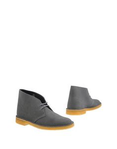 Полусапоги и высокие ботинки Clarks