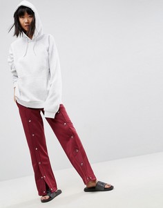 Спортивные брюки с кнопками ASOS - Красный