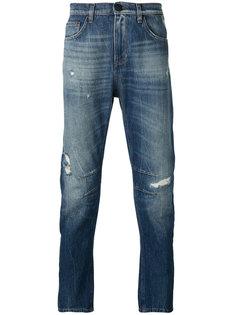 джинсы с рваными деталями Versace Jeans